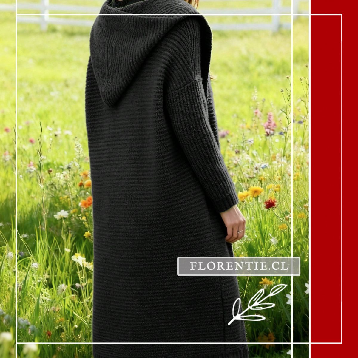 Vista lateral y trasera de modelo con cárdigan largo negro oversize con capucha prominente, mostrando la caída larga y la textura de punto en jardín primaveral.