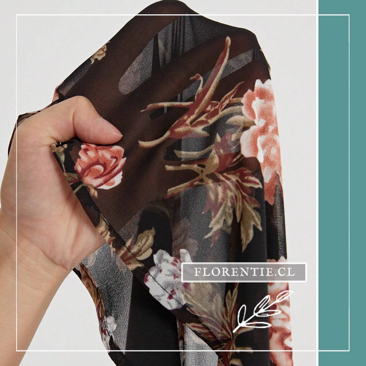 Detalle tela vestido negro flores rosadas