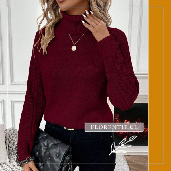 Modelo con bolso negro de cadena luciendo chaleco burdeo de cuello tortuga y mangas caladas, ideal para salidas de invierno y look smart casual.