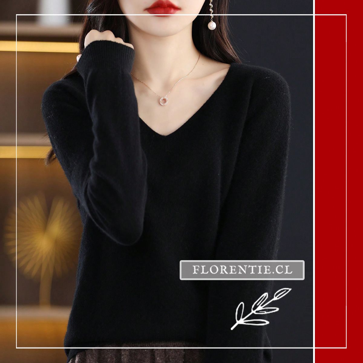 Modelo luciendo sweater negro de lana merino 100% con escote en V clásico y puños acanalados, combinado con falda marrón.