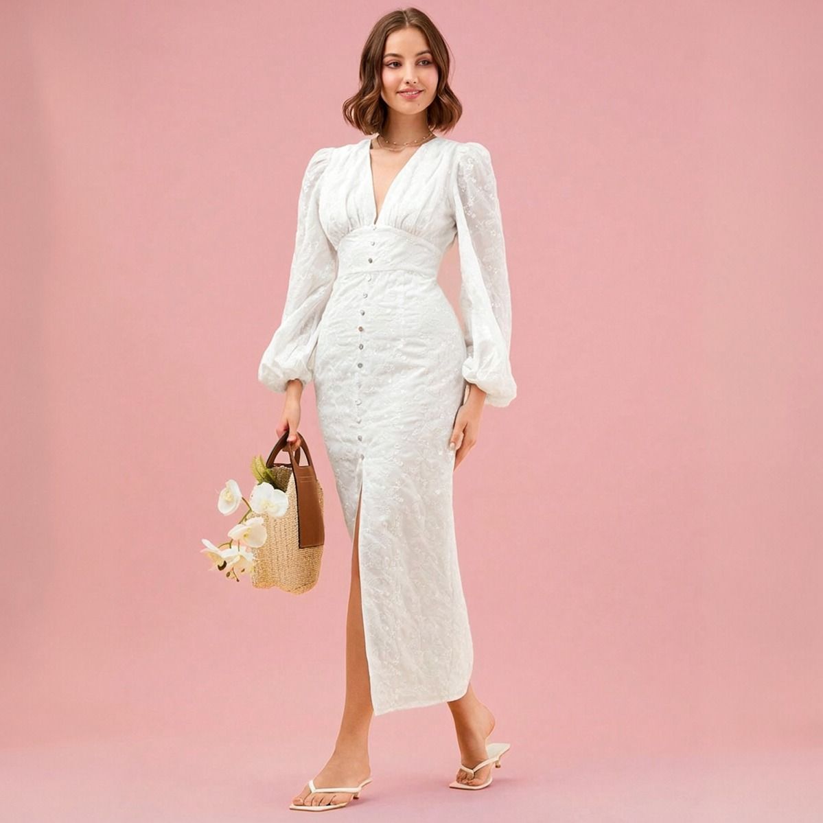 Vestido midi blanco bordado con escote V profundo y mangas globo, vista frontal ligeramente angular
